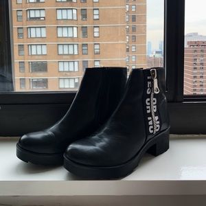 Steve Madden black leather zip up boots